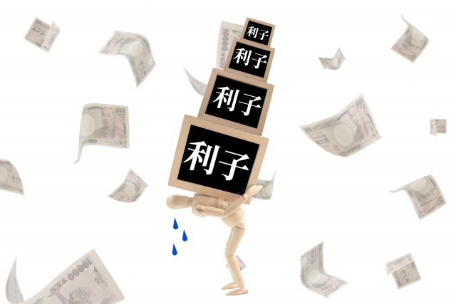 お金を手に頭を抱える。鉾田市で債務整理の無料相談が司法書士に可能